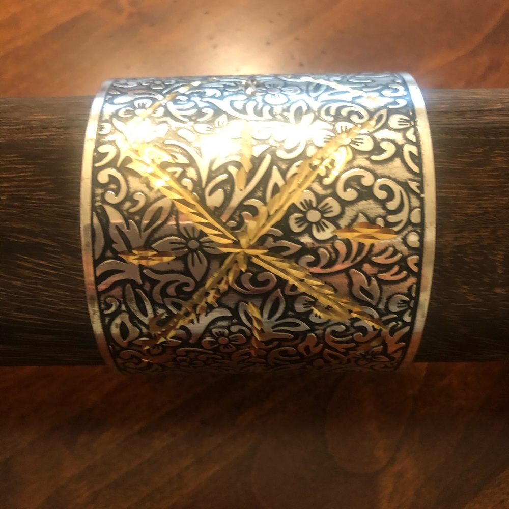 Gorgeous silver cuff bracelet with gold.